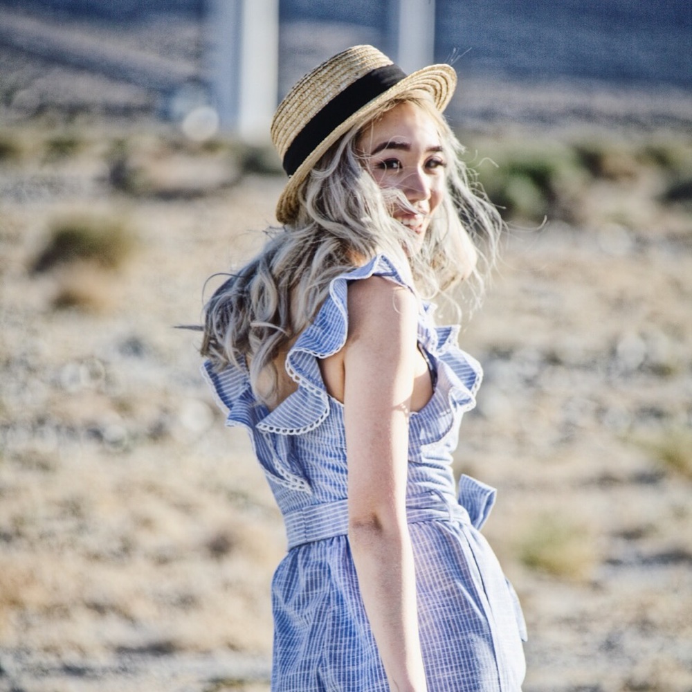 Boater hat with a cute black bow